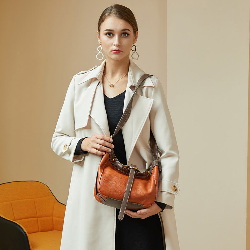 Hand-held top grain bucket bag female color matching high-end shoulder bag niche messenger bag tide