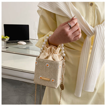 Popular bag women’s 2026 new beach bucket bag straw pearl chain shoulder messenger bag