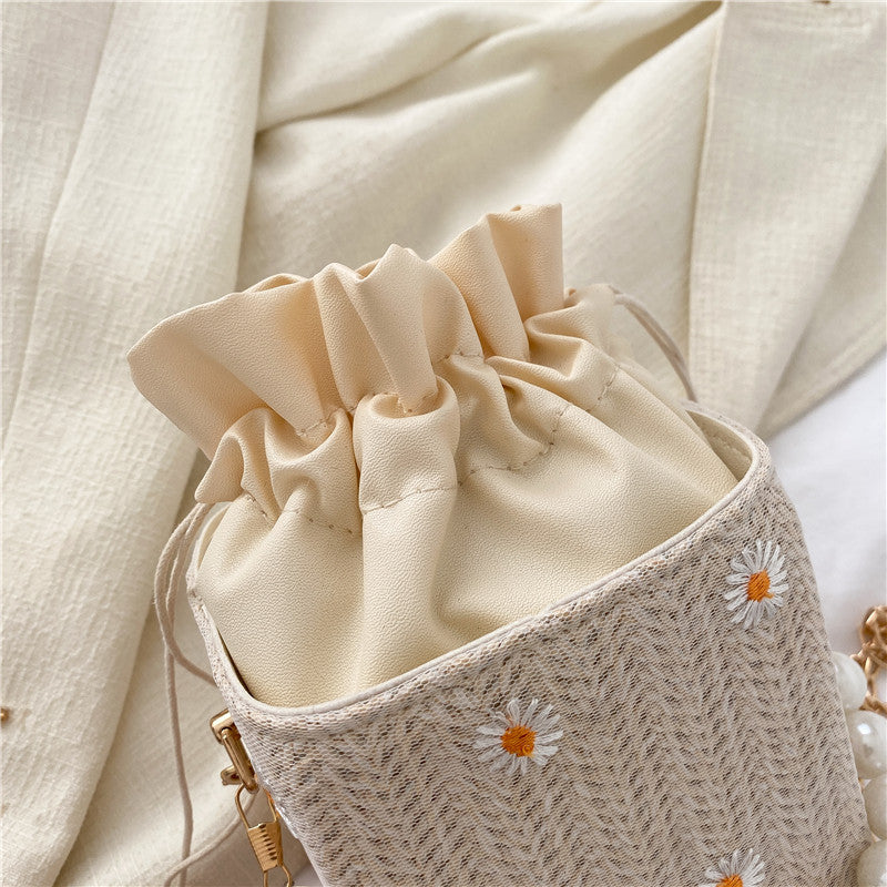 Popular bag women’s 2026 new beach bucket bag straw pearl chain shoulder messenger bag
