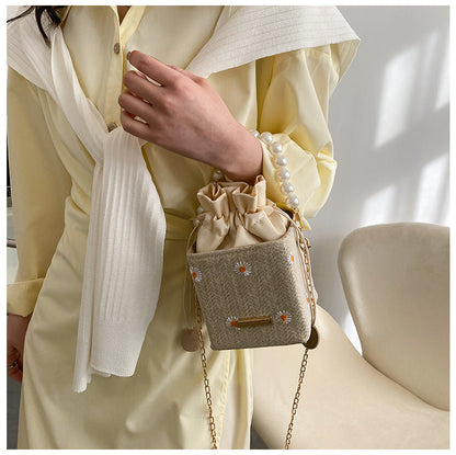 Popular bag women’s 2026 new beach bucket bag straw pearl chain shoulder messenger bag