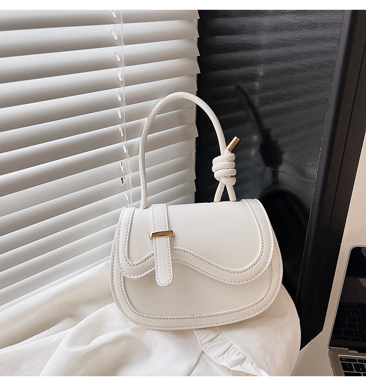 The original design saddle bag single shoulder messenger bag female fresh small bag simple fashion handbag