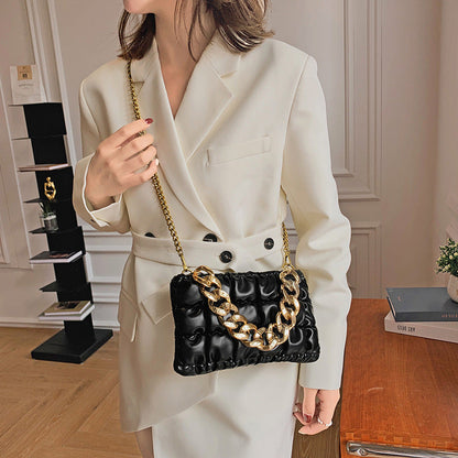 The 2026 new fashionable personality simple bag wrinkled shouldered woman bag stylish texture oblique cross-checkered bag