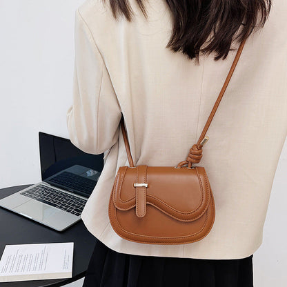 The original design saddle bag single shoulder messenger bag female fresh small bag simple fashion handbag